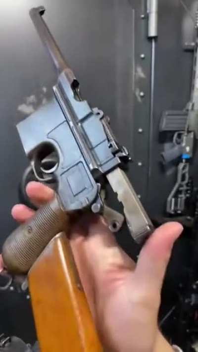 Mauser C96 Broomhandle in a wooden holster. Now that’s German Engineering