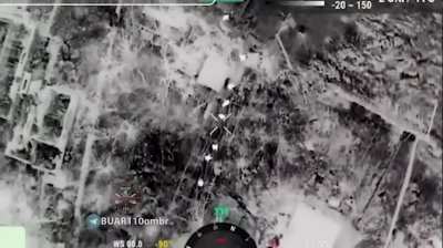BUAR 110 OMBr drone bomber lands a shot in the middle of a large group of Russian soldiers moving into buildings near Avdiivka. January 2024