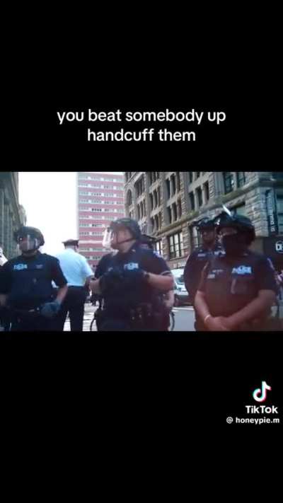 A protestor yells out the amount of money different NYPD police officers have cost the city in lawsuits. The city paid out $206m in police misconduct lawsuits last year.