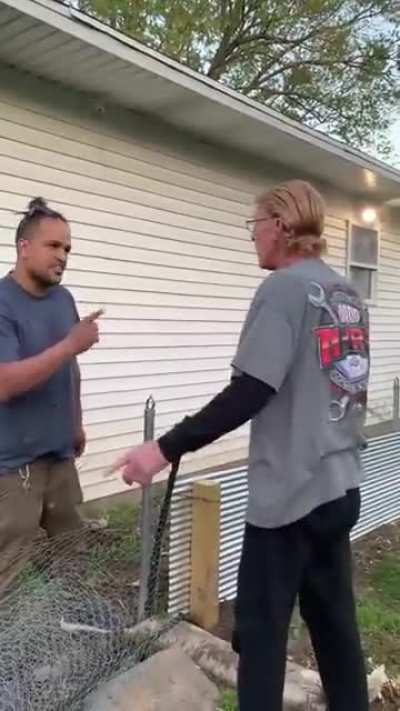 Two neighbors having a fence dispute