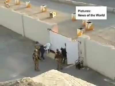 British soldiers brutally beating Iraqi children.