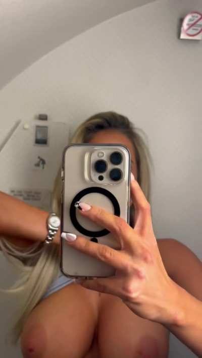 Some of the best tits you'll see flashing on a plane