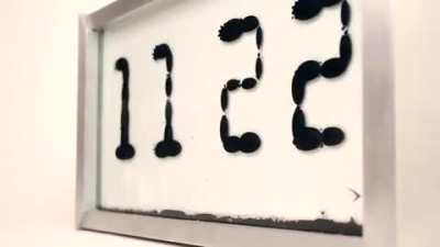 This Ferrofluid clock