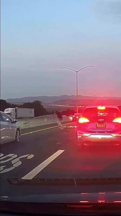 Squeezing between 2 cars with a wide motorcycle