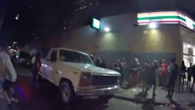 BLM protestors beat man and woman after man tries to prevent a robbery. Man is later punched and kicked unconscious in the street after crashing.