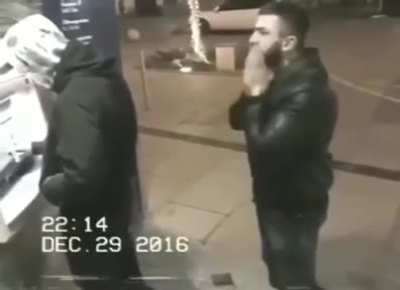 Man steals a wallet then notices he's being filmed...