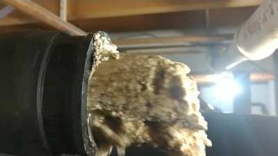 Unclogging a grease clogged pipe