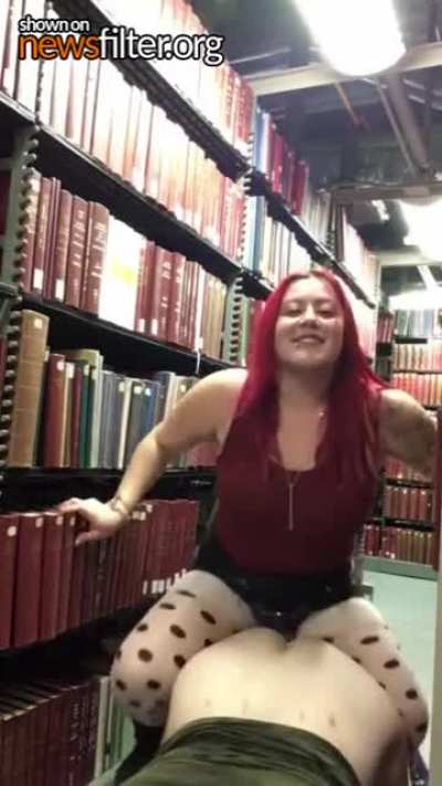 Lesbian sex in public library