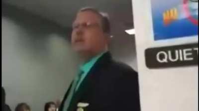 Guy tries to take a camera in a courtroom