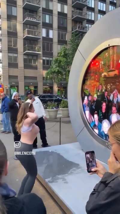 New Angle - Woman flashes her boobs in New York at Dublin to NY portal