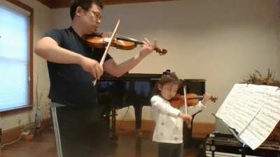 Father-Daughter Bonding Over Reading the Bach Double