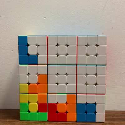 Playing Tetris with Rubik's cube.