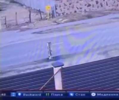 Moment rocket hits the ground in a street in Kiev city but doesn’t explode.