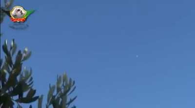 Liwa al-Tawhid fighters lean back to put rounds up at passing SyAAF jets - 1/10/2013
