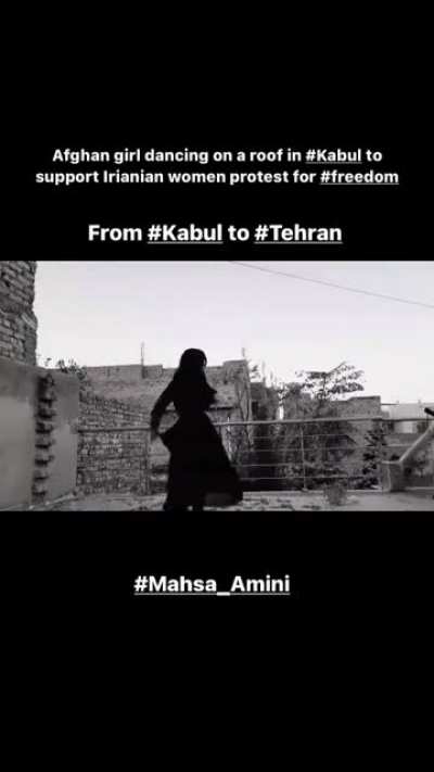 Afghan girl dancing on a roof in #Kabul to support Irianian women protest for #freedom From #Kabul to #Tehran
