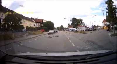 Cyclist tries his luck, gets cut in half. Cyclist walked away totally unharmed.