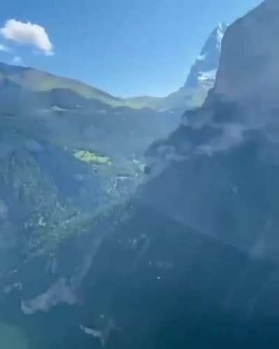 Walking on iron bars embedded on the slopes while enjoying the great scenics