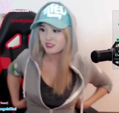 kimi showing off her cleavage and ass