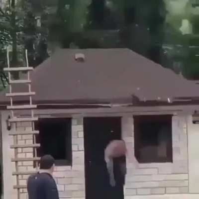 Trying to jump from the roof into a pool.