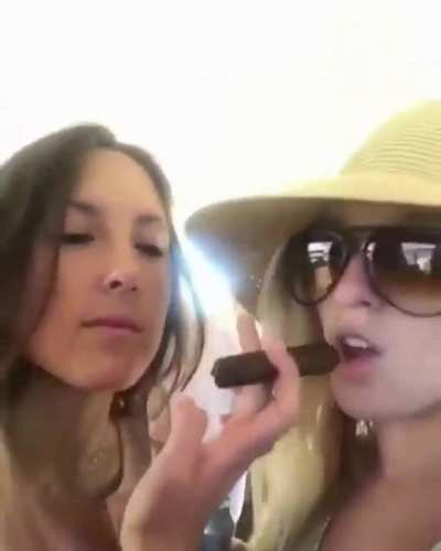 Trying to smoke a cigar to make a cool Instagram video