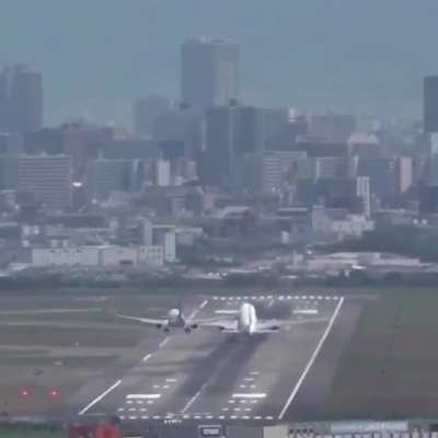 A takeoff, an attempted landing, same runway, at same time
