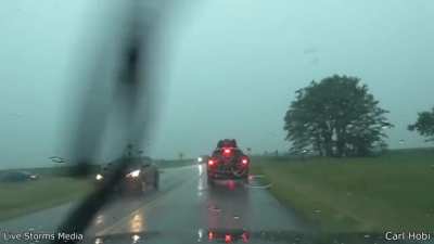 The moment lightining hits this moving car. The family inside has been reported safe
