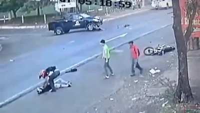 Motorcyclists hit a truck and it sends them flying