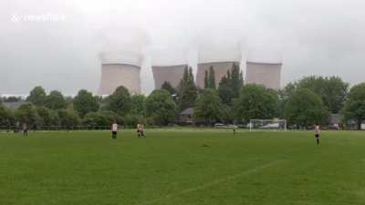 A controlled demolition that took place at a power station in Staffordshire,UK