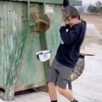 Idiot fights a bin