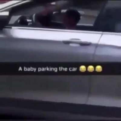 A baby parking the car 😂😂😂