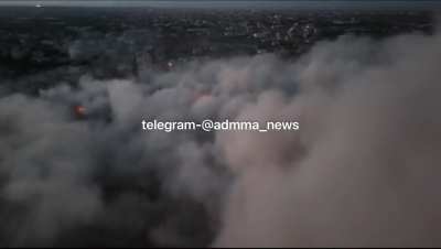 Slow motion aerial footage of air bombing and aftermath, Gaza Strip