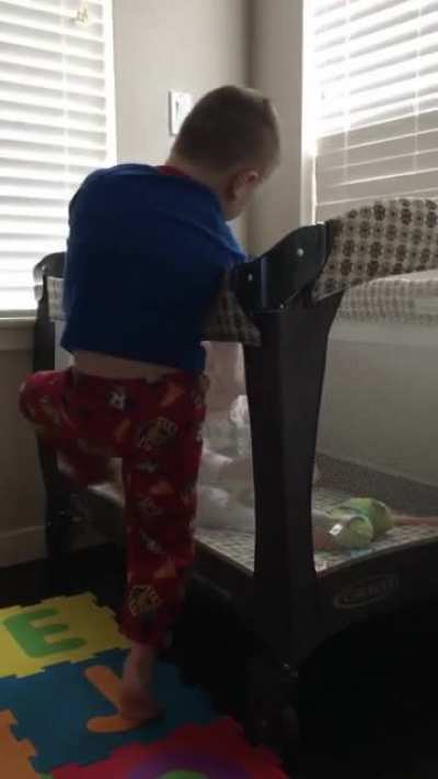 My oldest introduces the baby to foam swords