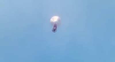 Filling a hot air balloon with fireworks, what you see next is every man crying for their mommy