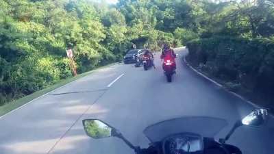 If you're a dickhead, it's only a matter of time before you get a chance to meet your maker. For this guy? Ten seconds. Both parties came out fine, with biker sustaining some injuries.