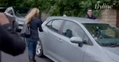 Lesbian left-wing MP whose sister was murdered by a neo-Nazi gets harassed by a homophobe.