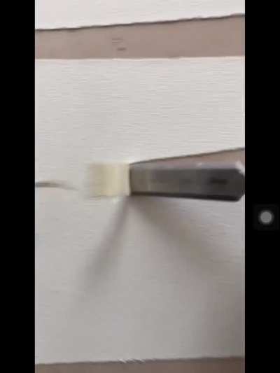 Satisfyingly stripping a wall with chisel
