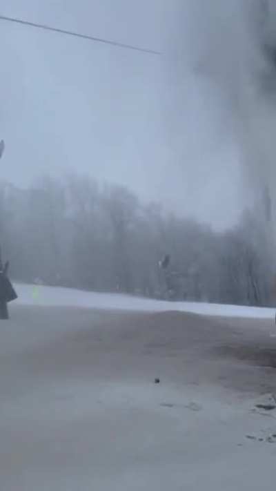 Ski lift stuck over burst pipe