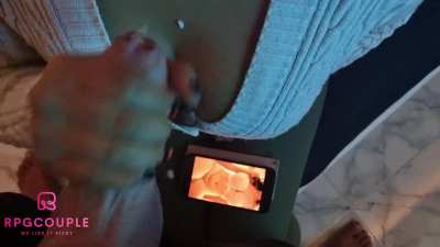 Giving a handjob while using a vibrator