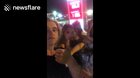 Woman repeatedly hits man on camera