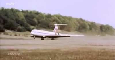 Germany, 1989 - Landing an IL-62 in a field near where it will be used as a display