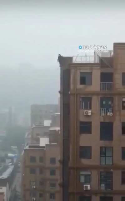 man falls off roof when trying to create a tiktok video