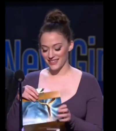 Kat on stage presenting at the 2012 Writers Guild Awards, 2/19/12