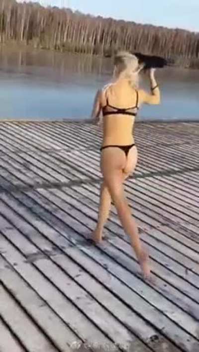 Jumping off a pier in winter