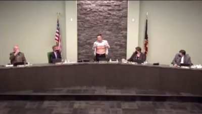 Lee Wong, an elected official in West Chester, Ohio & US Army veteran with 20-years of service, took his shirt off during a town hall meeting on Wednesday and revealed scars he received during his service. “Is this patriot enough?” he asked
