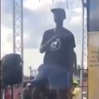 Man with three legs dancing on stage.