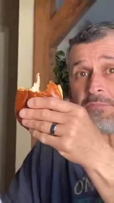 What's wrong with his sandwich.