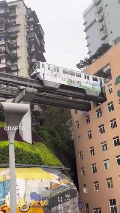 This Train going through a building