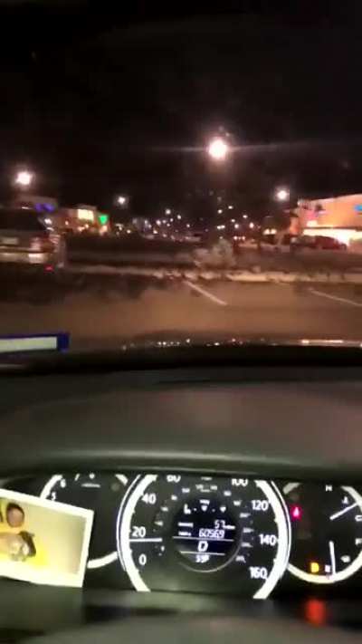 Trying to run over some pigeons on the parking lot