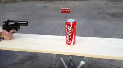 Nick shoots Coach's cola