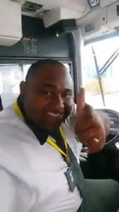 Bus driver shows off to camera